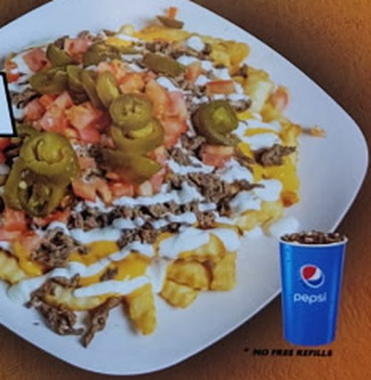 Asada fries with jalapeños and sour cream