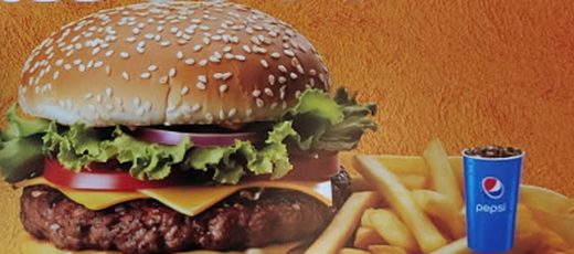 Cheeseburger with lettuce, tomato and fries
